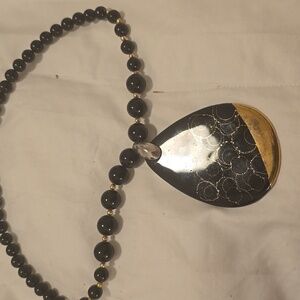 Elegant Black and Gold Pendant Necklace